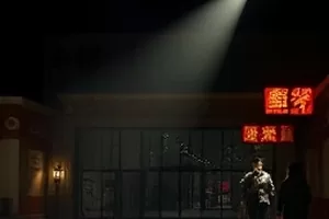 《灯火不熄》封面，深夜值班室的一盏台灯